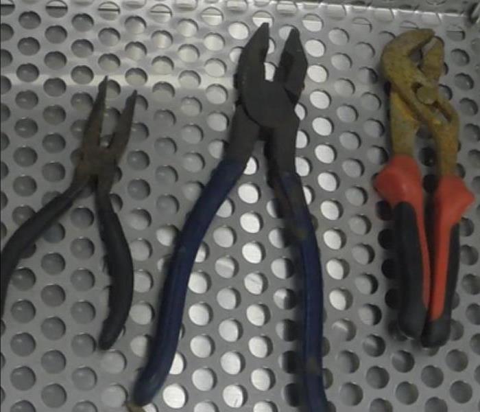   Soot covered tools.
