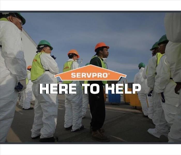 SERVPRO employees getting ready to walk into disinfecting job